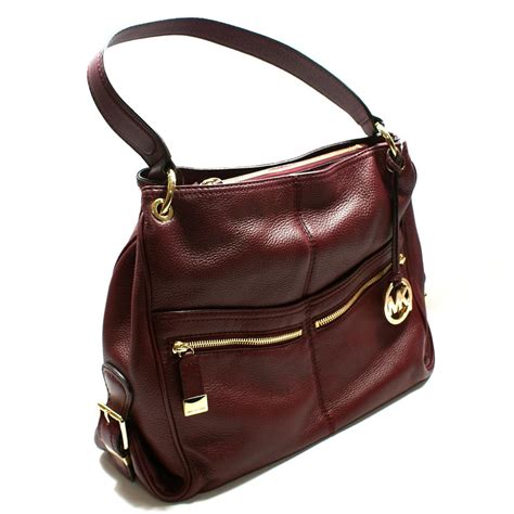 michael kors history of handbags|genuine leather Michael Kors handbags.